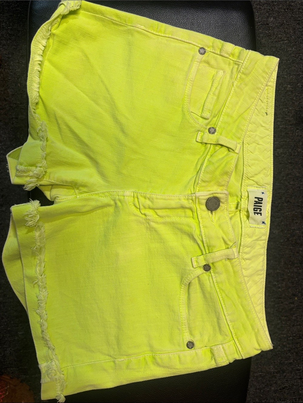 PAIGE High-Visibility Lime Denim Cutoff Shorts